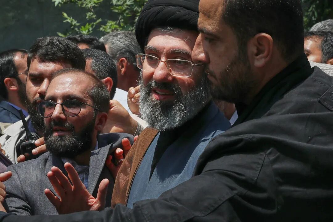 Mojtaba Khamenei, the son of Iran's late Supreme Leader Ayatollah Ali Khamenei, center, attends the annual Quds Day rally in Tehran, Iran, May 31, 2019. (AP Photo/Vahid Salemi)